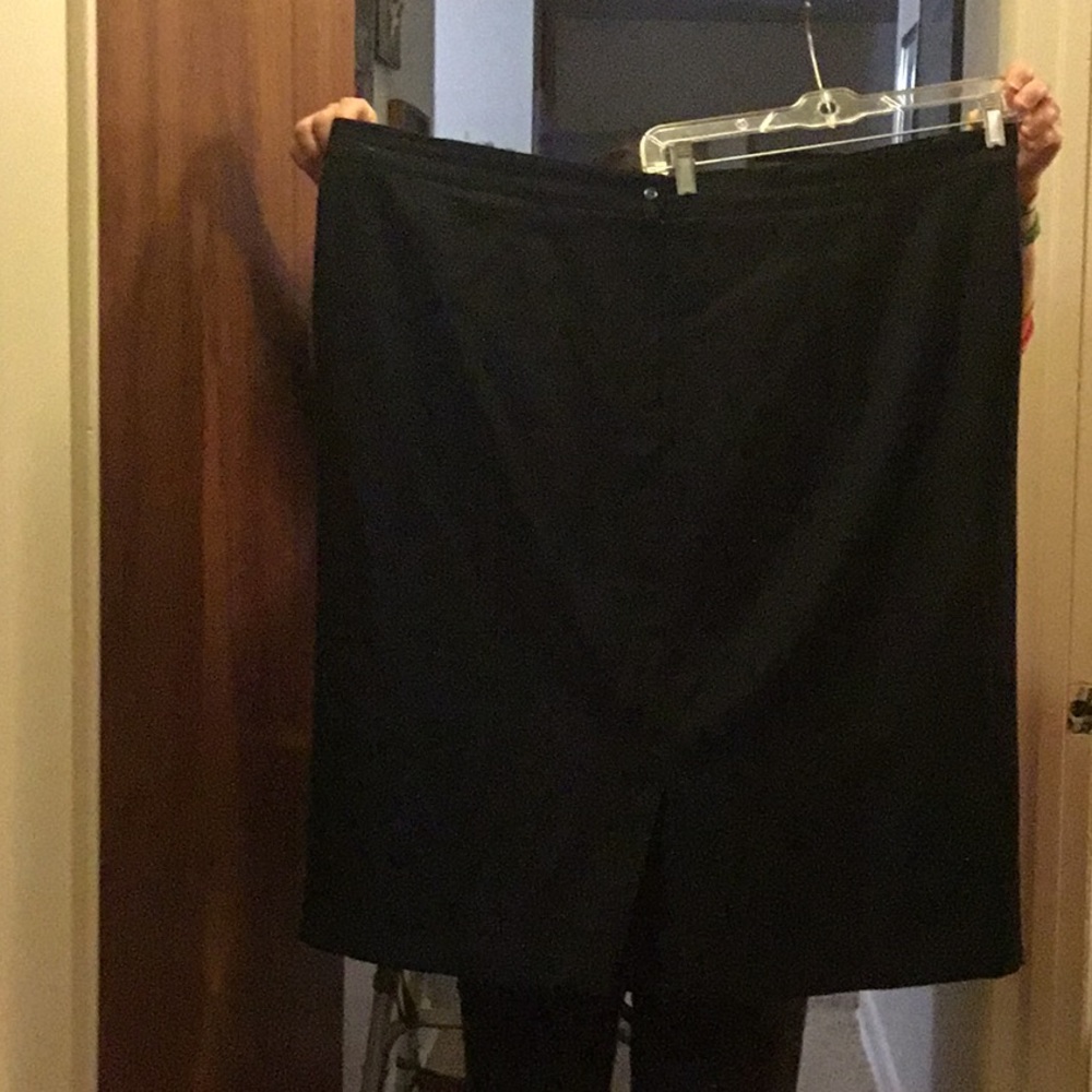 Possible Lane Bryant. Size 26. It is completely lined and must be dry cleaned.